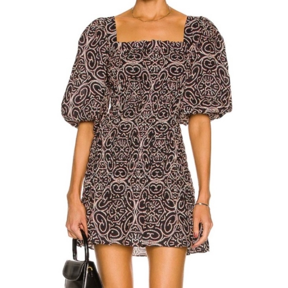 Alexis black dress with White and red Patterns